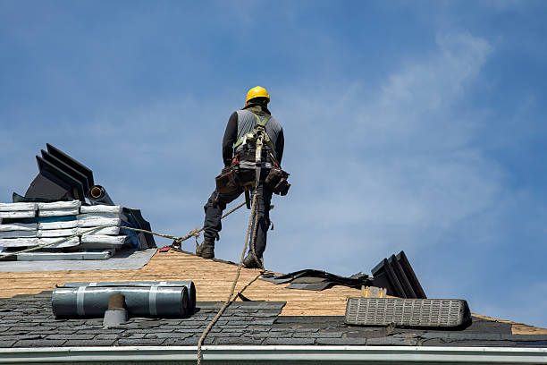Professional Roof Replacement technician working in South Jamesport, NY